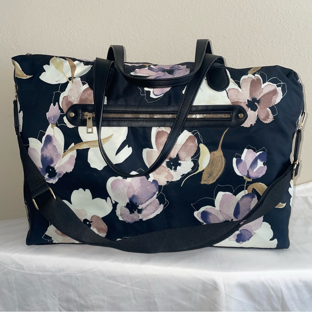 a new day weekender tote bag